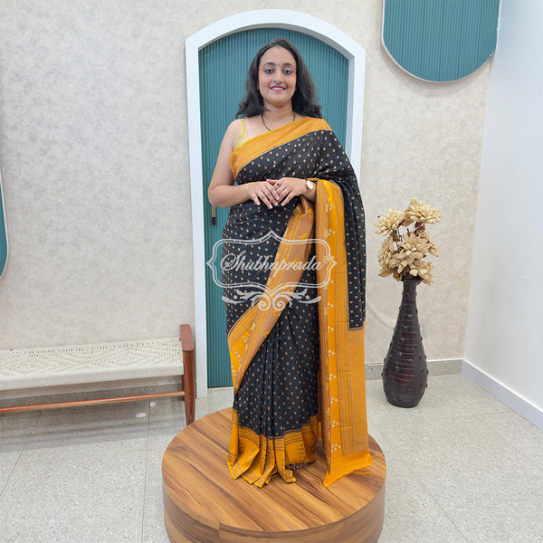 Black & Orange Rich Buti Premium Khaddi Georgette Banarasi Saree
